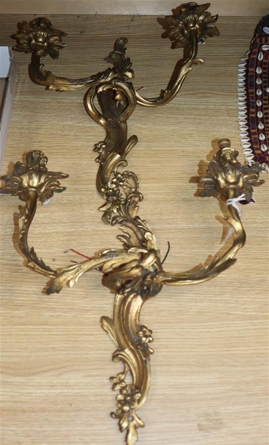 A large pair of rococo style ormolu wall lights height 37cm